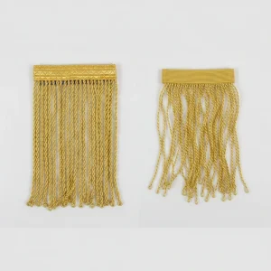 Close-up detail of dense metallic fringe strands showing heavyweight construction for military dress uniforms