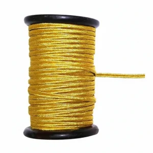 gold-silver-ceremonial-braid-laces-spool Close-up detail of gold and silver metallic braid lace showing luxurious weave for military dress uniforms