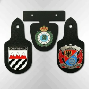 close up of leather pocket badge showing metal crest attachment and epoxy finish