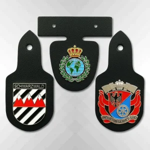 close up of leather pocket badge showing metal crest and epoxy enamel finish